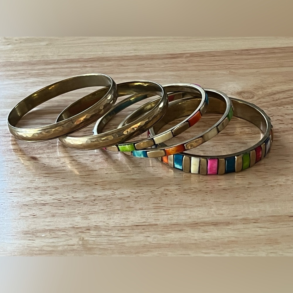 Gold toned bracelets